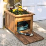Stylish DIY Garden Hose Holder with Pallet Wood Planter